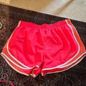 Pink and orange Nike shorts